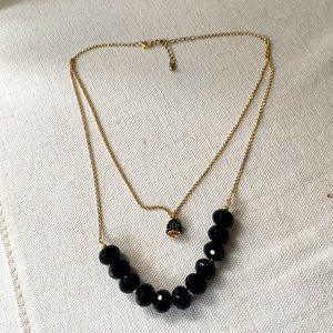 2 strand black Chrystal and brass bell necklace